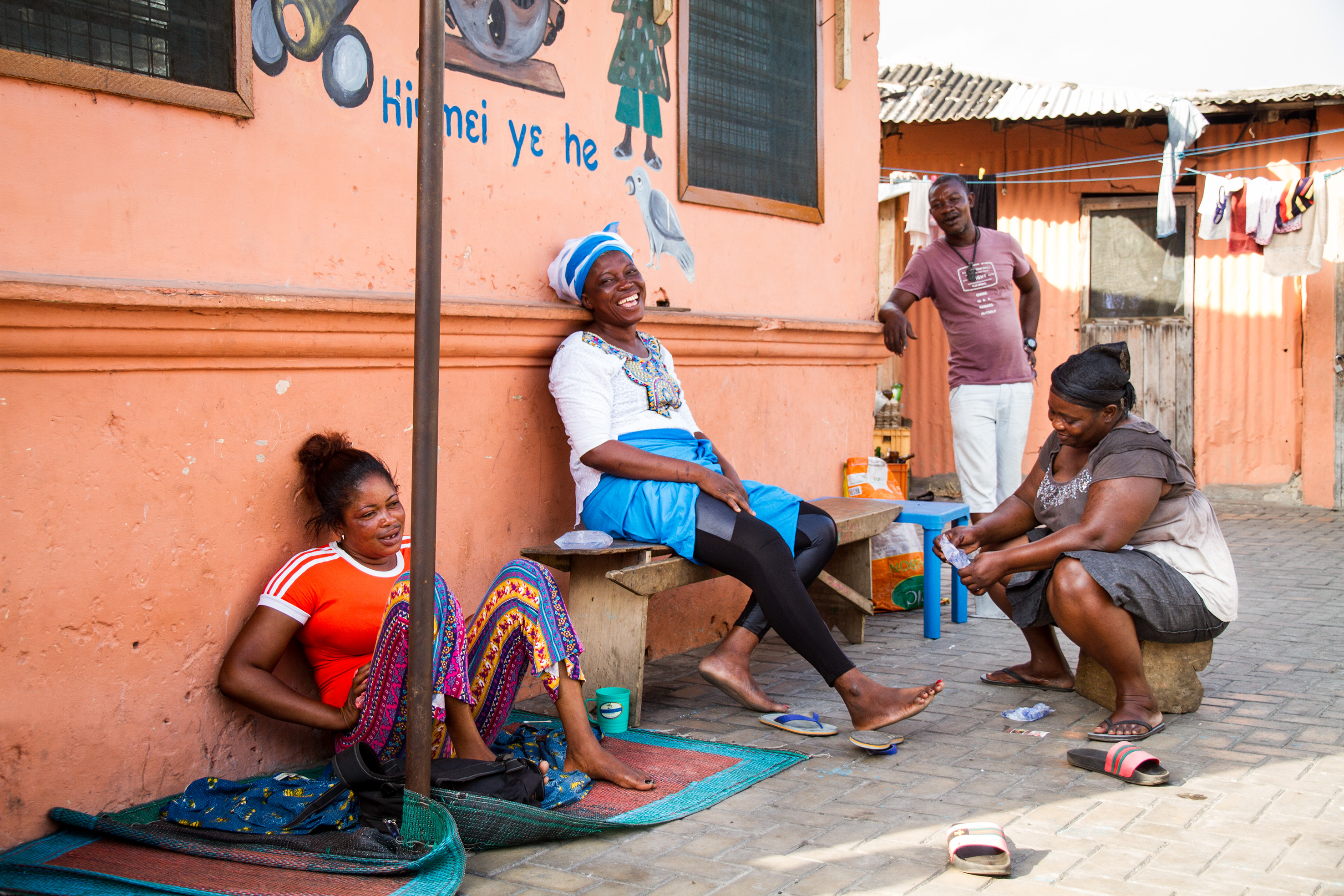 Residents relax on the newly paved streets