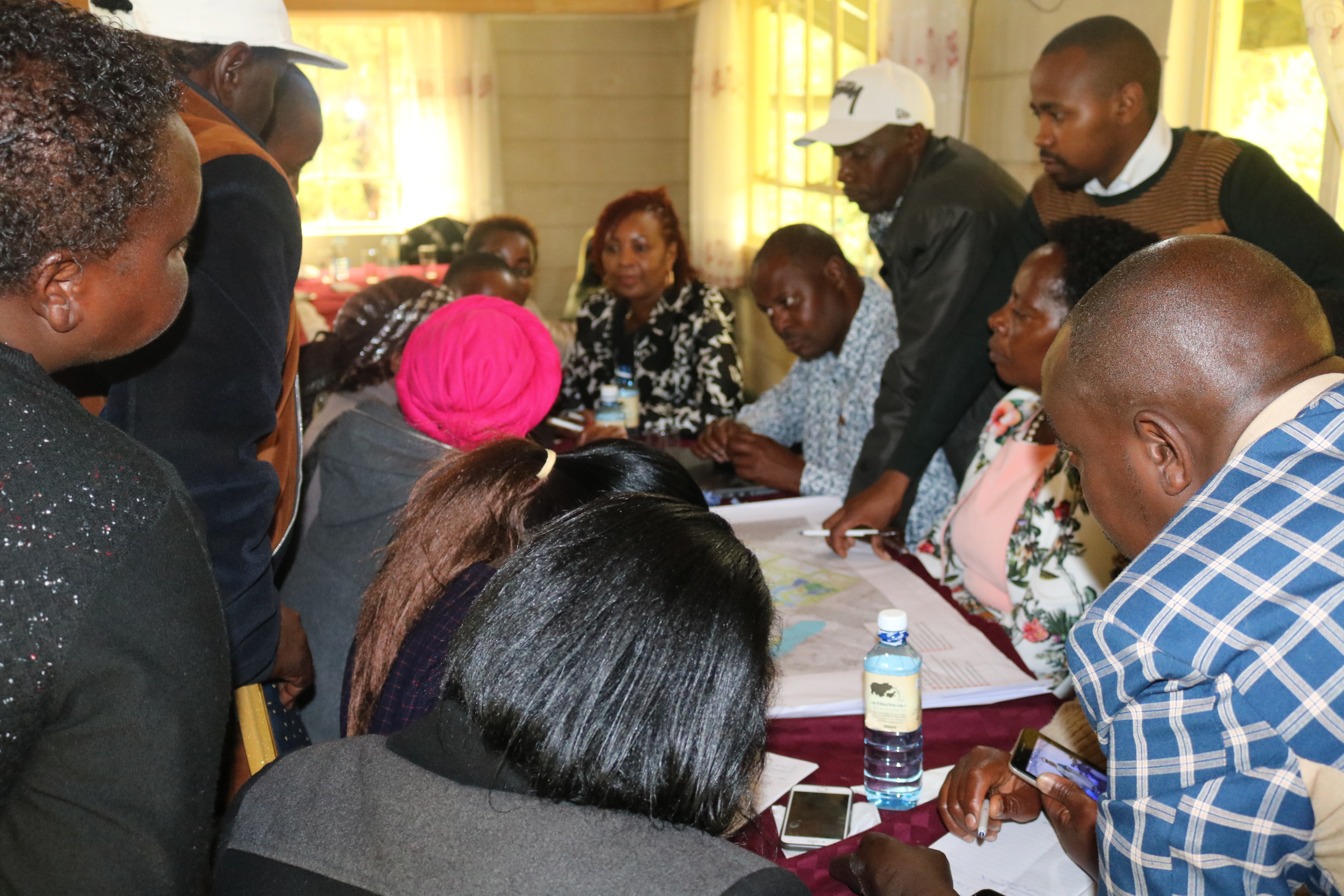 Participants at the workshop discussing te market overview map