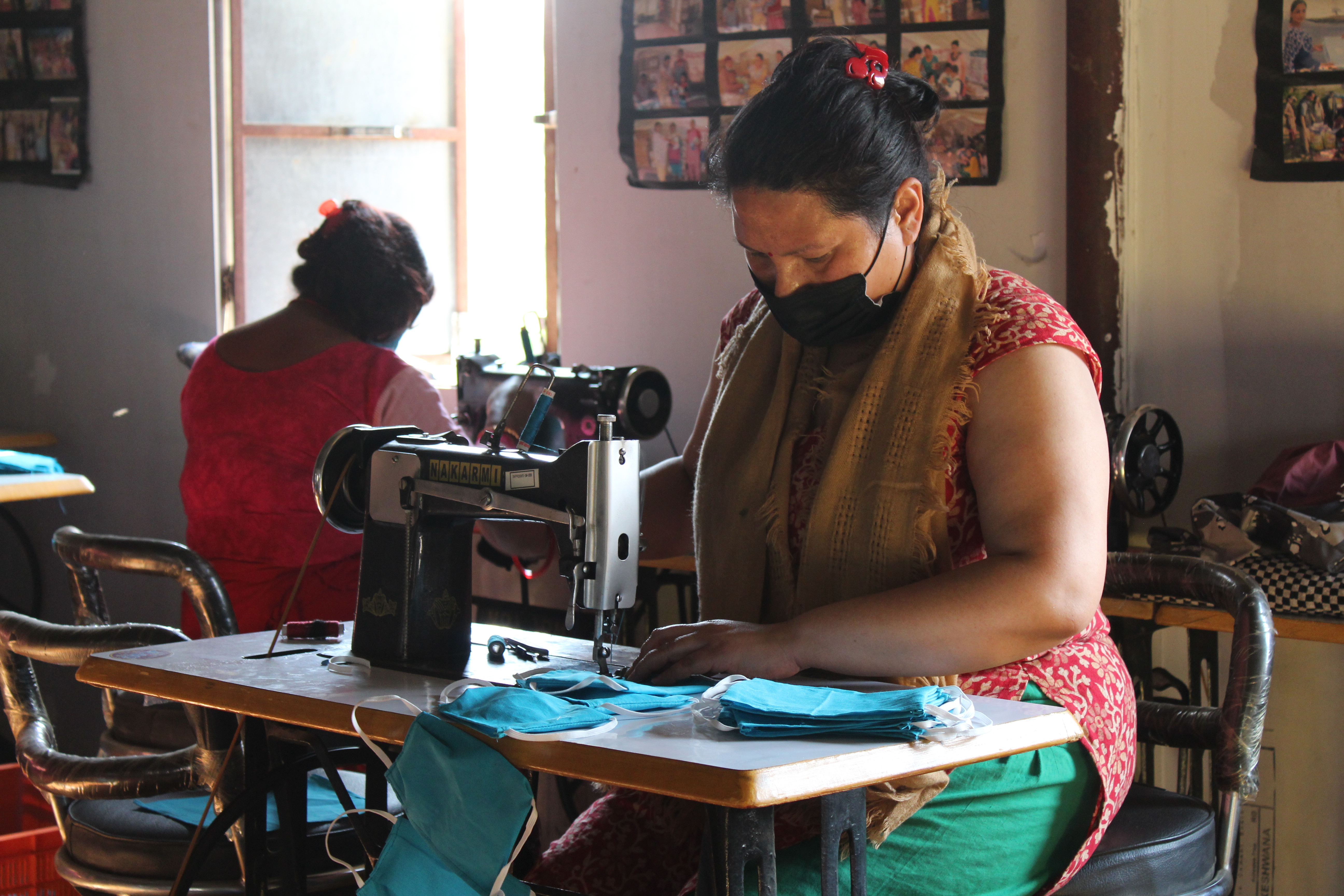 Bidhya Nakarmi making face masks for living as the COVID hit the country. Bungamati. Lalitpur. NEP