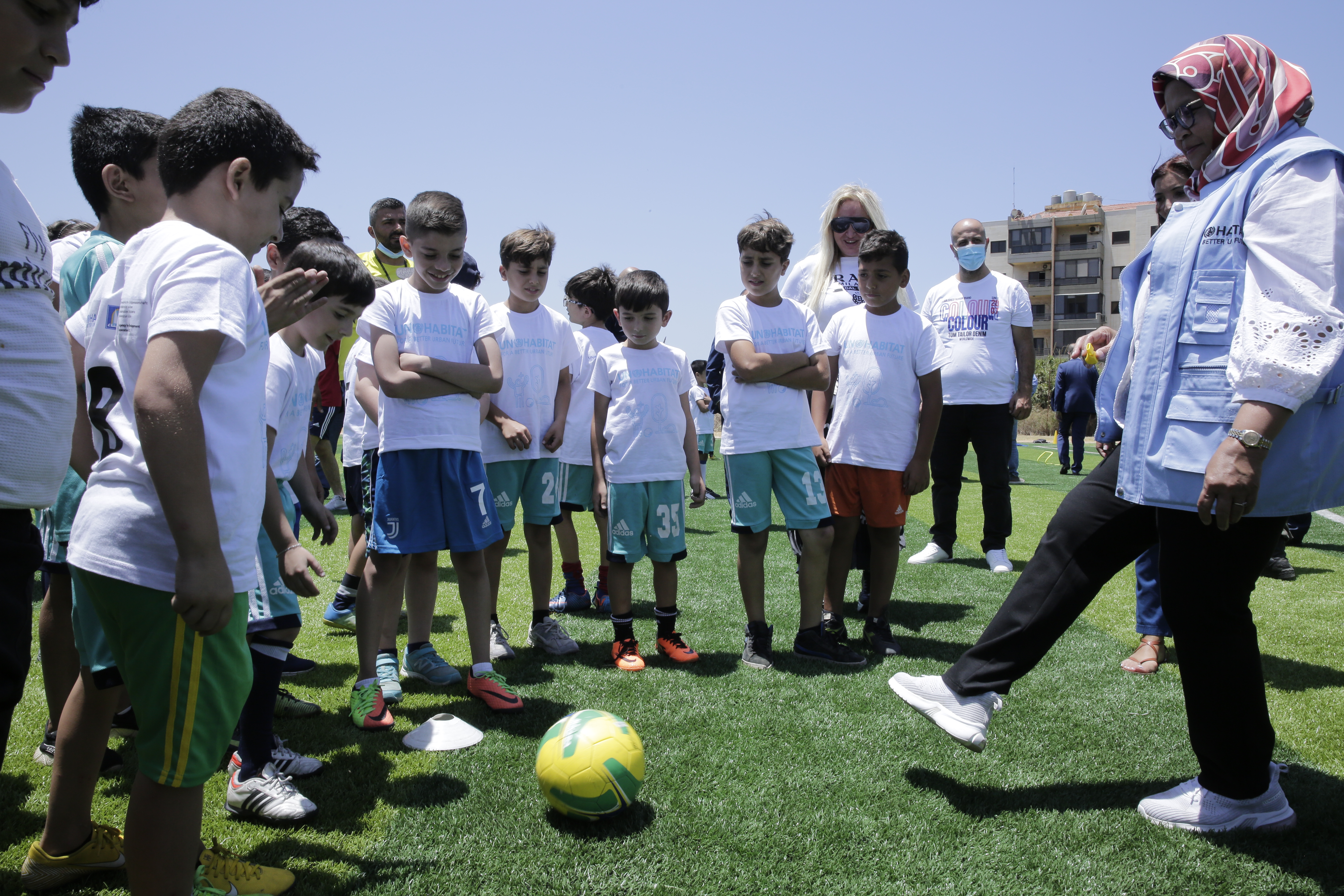 UN-Habitat Executive Director, Ms. Maimunah Mohd Sharif inaugurates the first football game played on the UN-Habitat implemented football field in Mina, Tripoli. The field forms one of 9 activities under this UN-Habitat project funded by the Swiss Agency for Development and Cooperation.