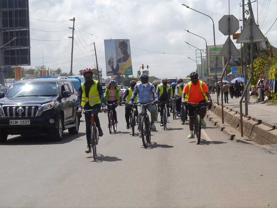 Cyclists sharing the road with motorized transport