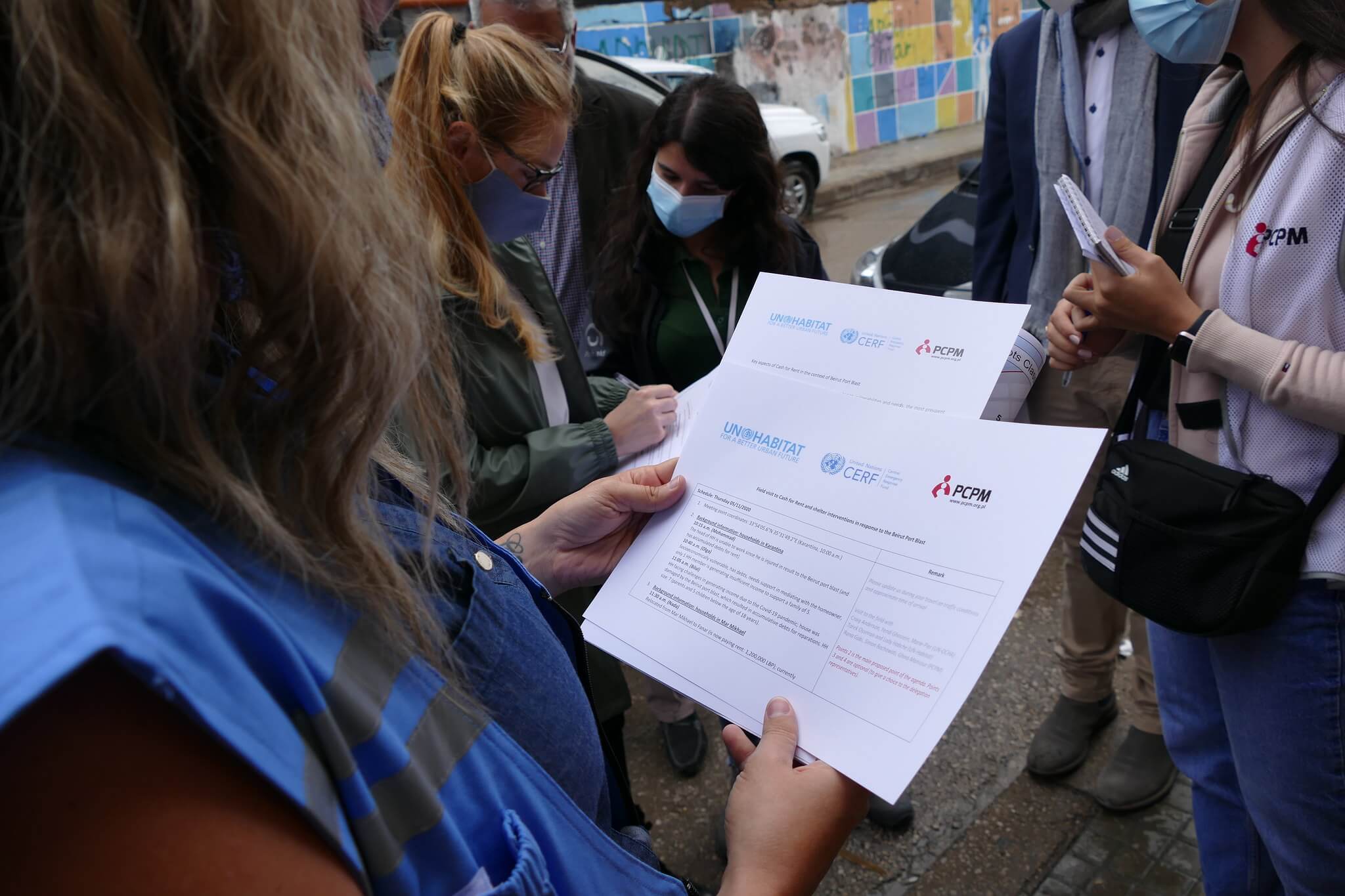 UN OCHA colleague reviews the homes selected for the initial eligibility assessment