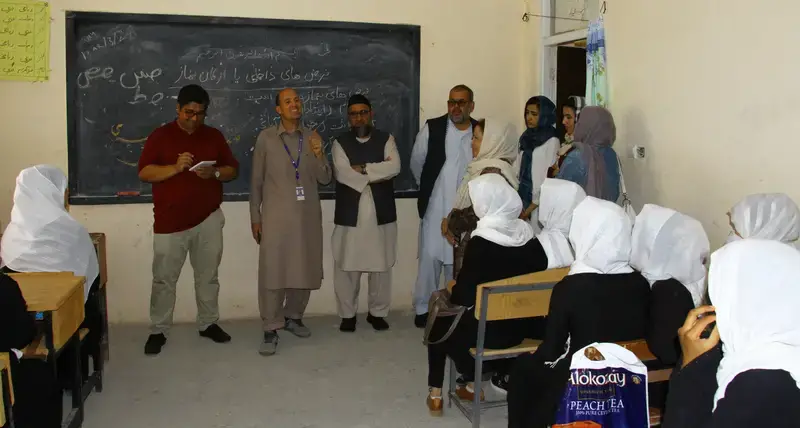 UN-Habitat advisers visiting the new hard wall school assisted by Afghanistan Urban Peace-building Programme