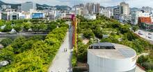 An internal road leading to the Asia Culture Center information desk. You can see the green forest.